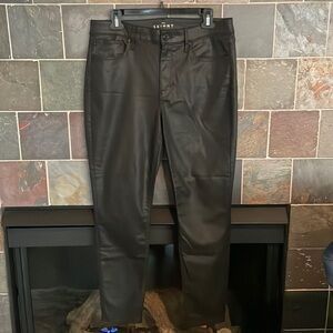 White House Black Market black coated skinny jeans in size 8